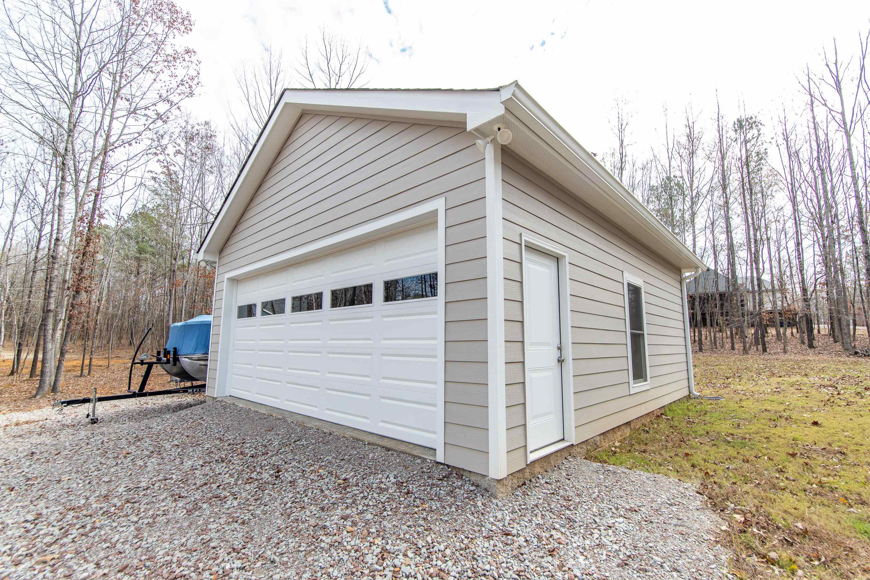 85 Rustic Trail Counce, TN 38326 - Photo 20 of 24 a view of a house with a yard
