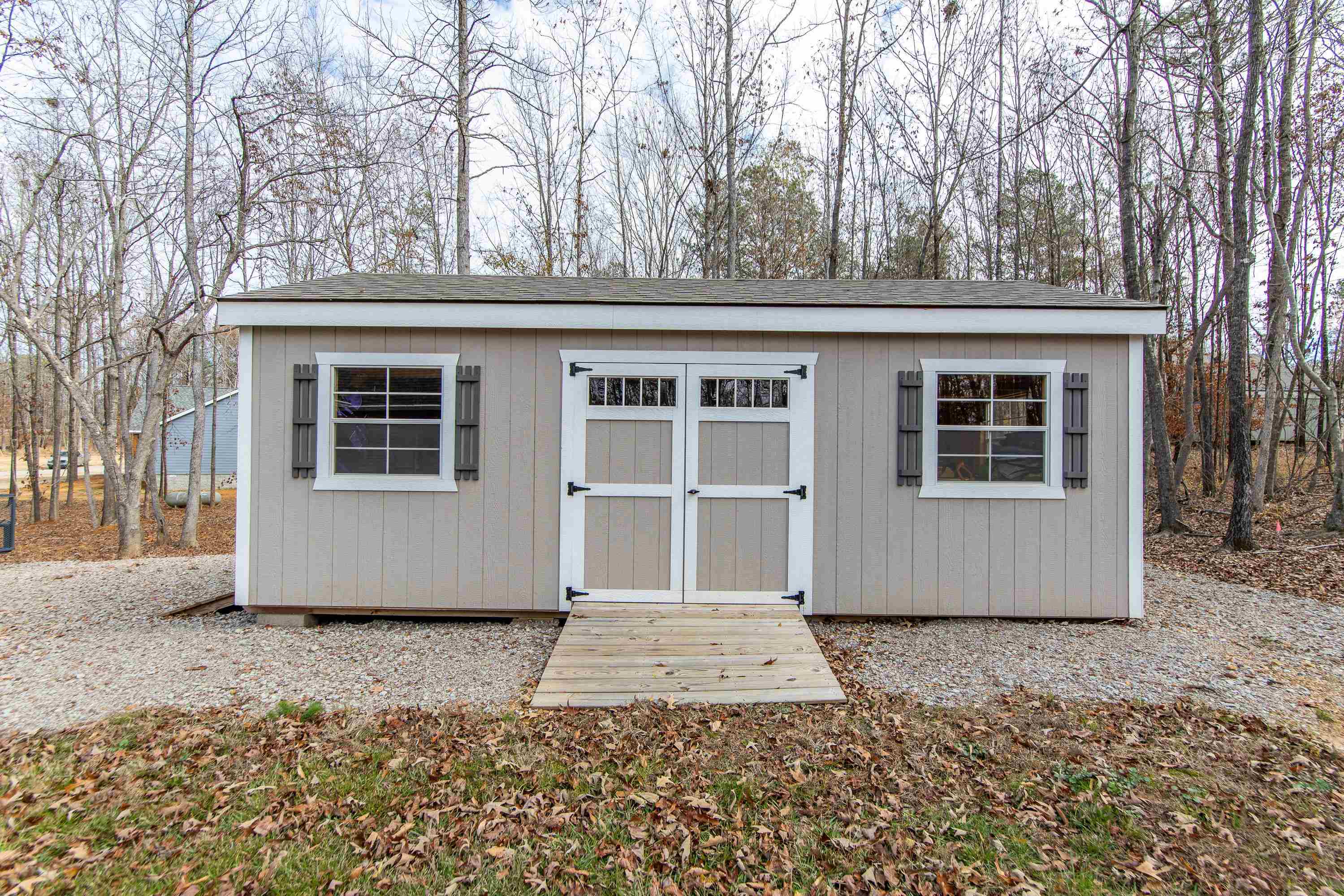 85 Rustic Trail Counce, TN 38326 - Photo 22 of 24 a house with trees in the background