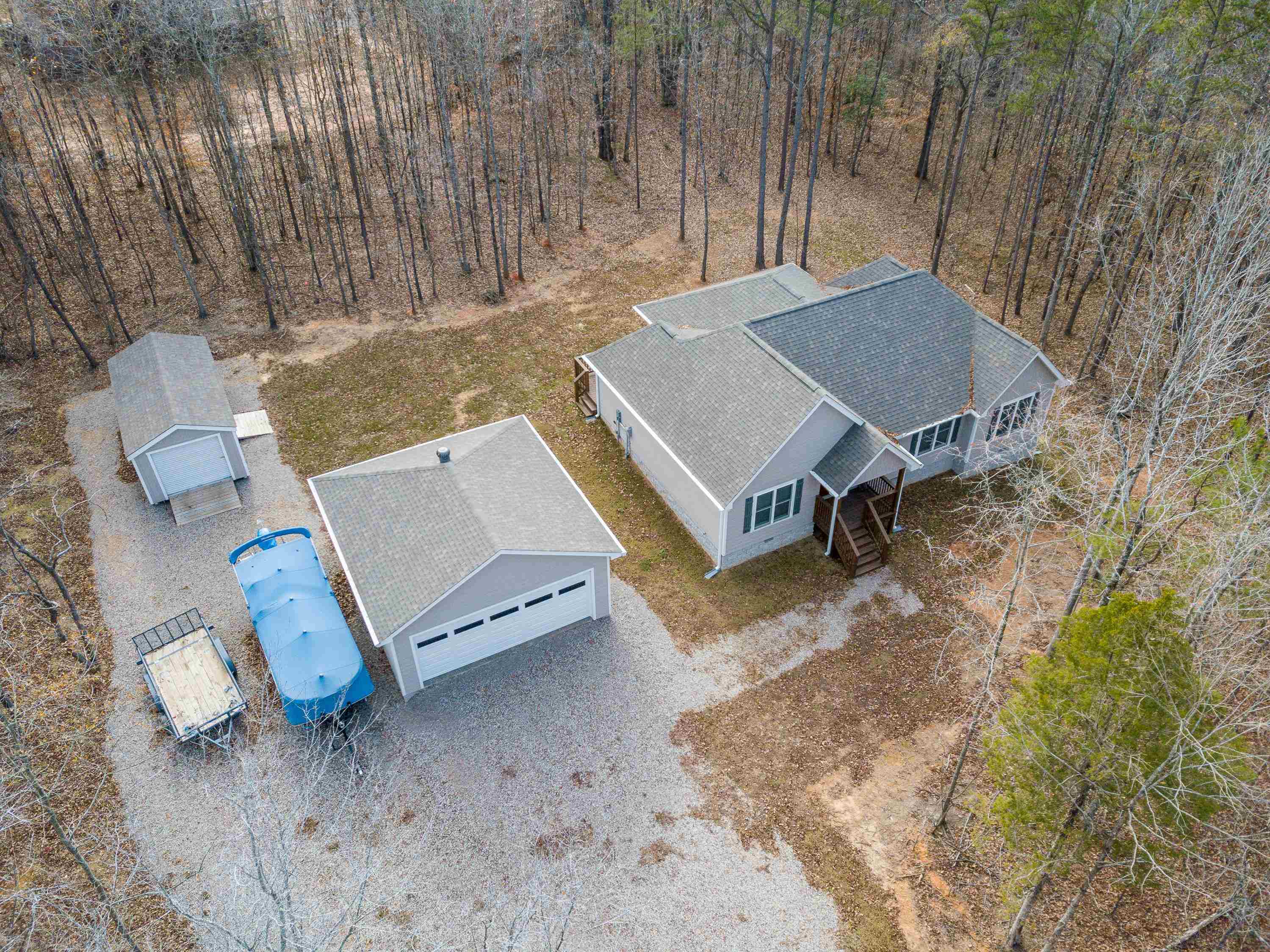 85 Rustic Trail Counce, TN 38326 - Photo 24 of 24 an aerial view of a house with backyard space and balcony