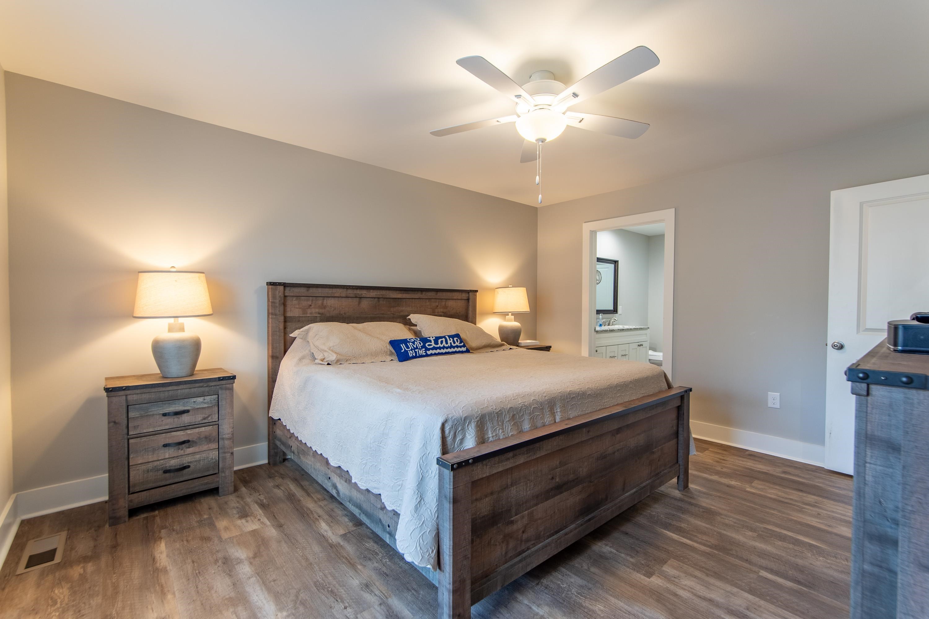85 Rustic Trail Counce, TN 38326 - Photo 10 of 24 a bedroom with bed and wooden floor