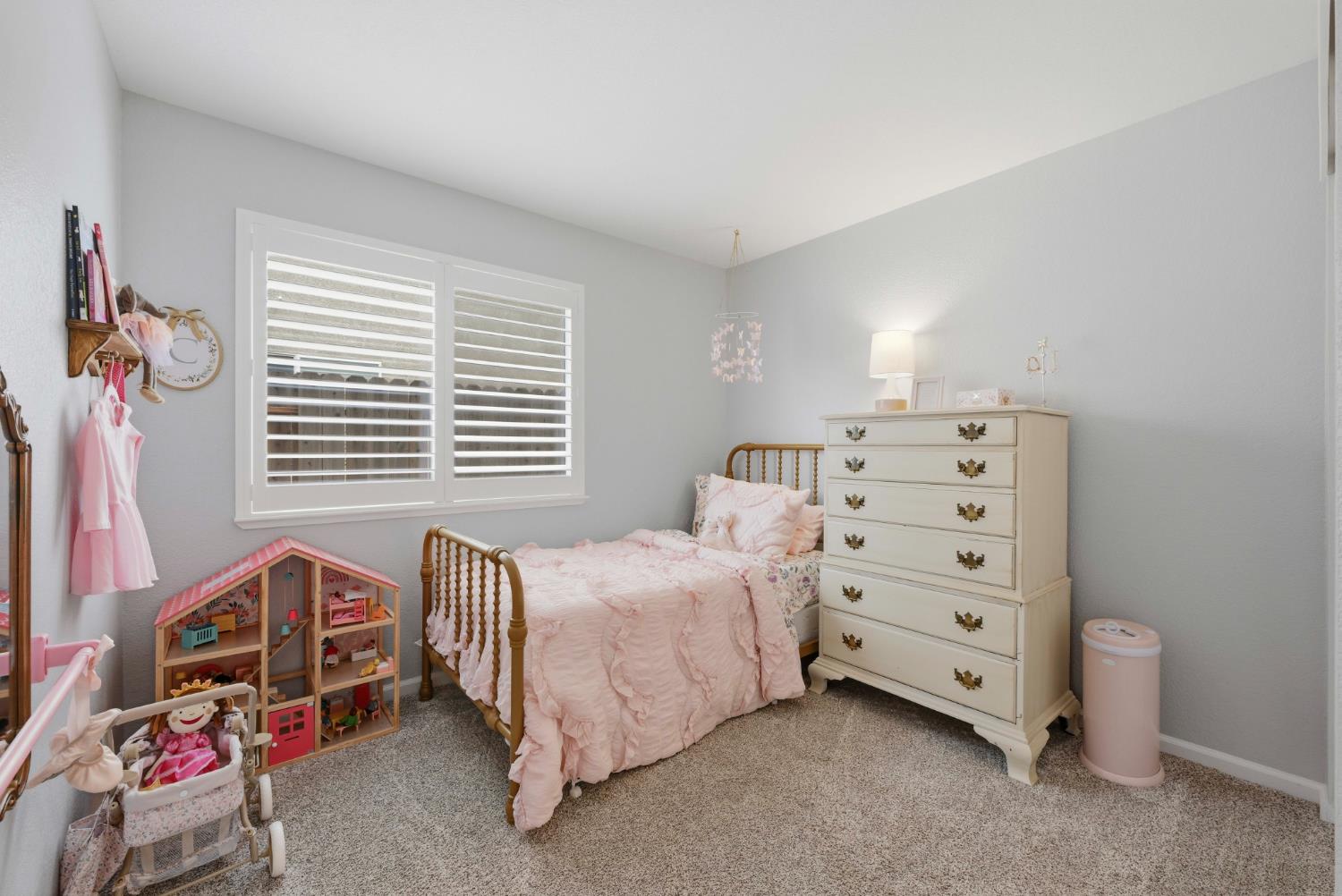5013 Charter Road Rocklin, CA 95765 - Photo 21 of 35 a bedroom with furniture and a window