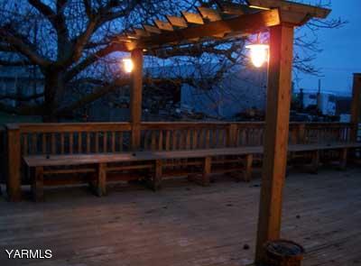 6261 Ashue Road Wapato, WA 98951 - Photo 14 of 15 a view of a deck with a yard