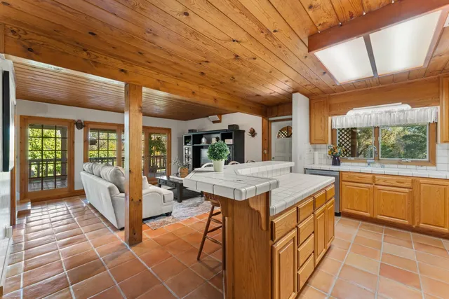 a spacious bedroom with a bed and window