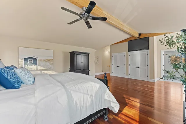 a view of a two chairs in the balcony