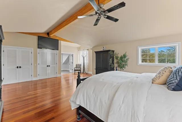 a view of two chairs in the balcony