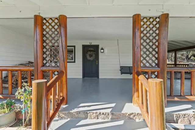 a aerial view of a house with a yard and garden