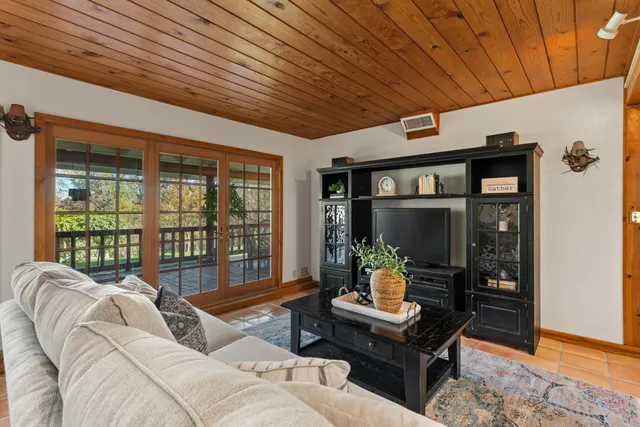 a living room with furniture and a table