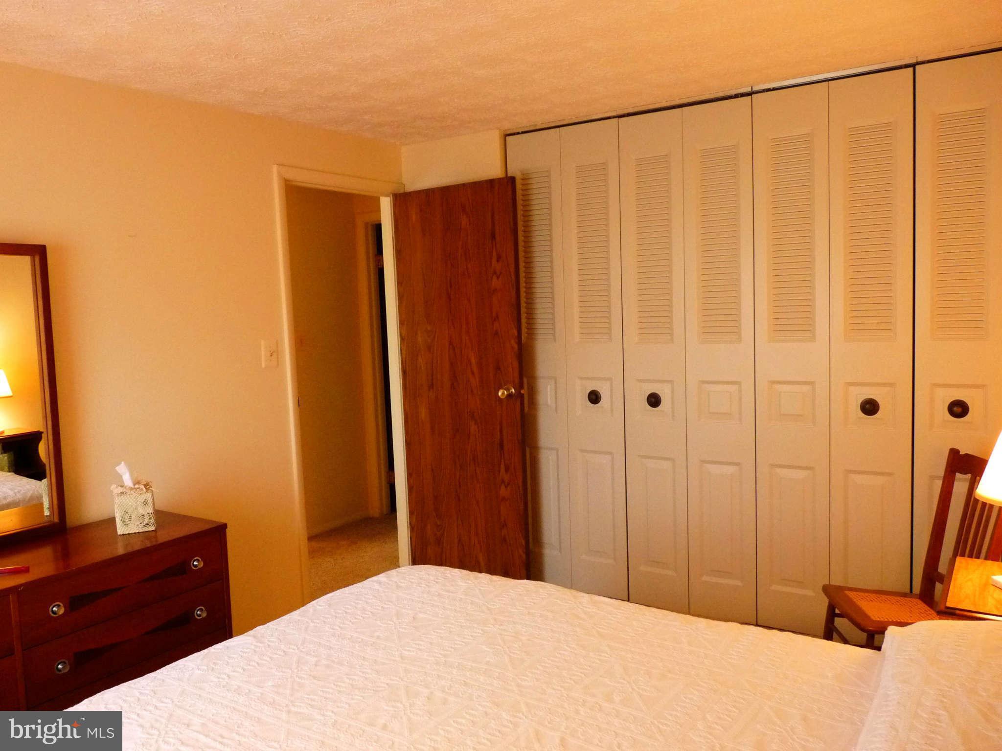 4 Box Baltimore, MD 21221 - Photo 14 of 30 a bedroom with a bed and a dresser