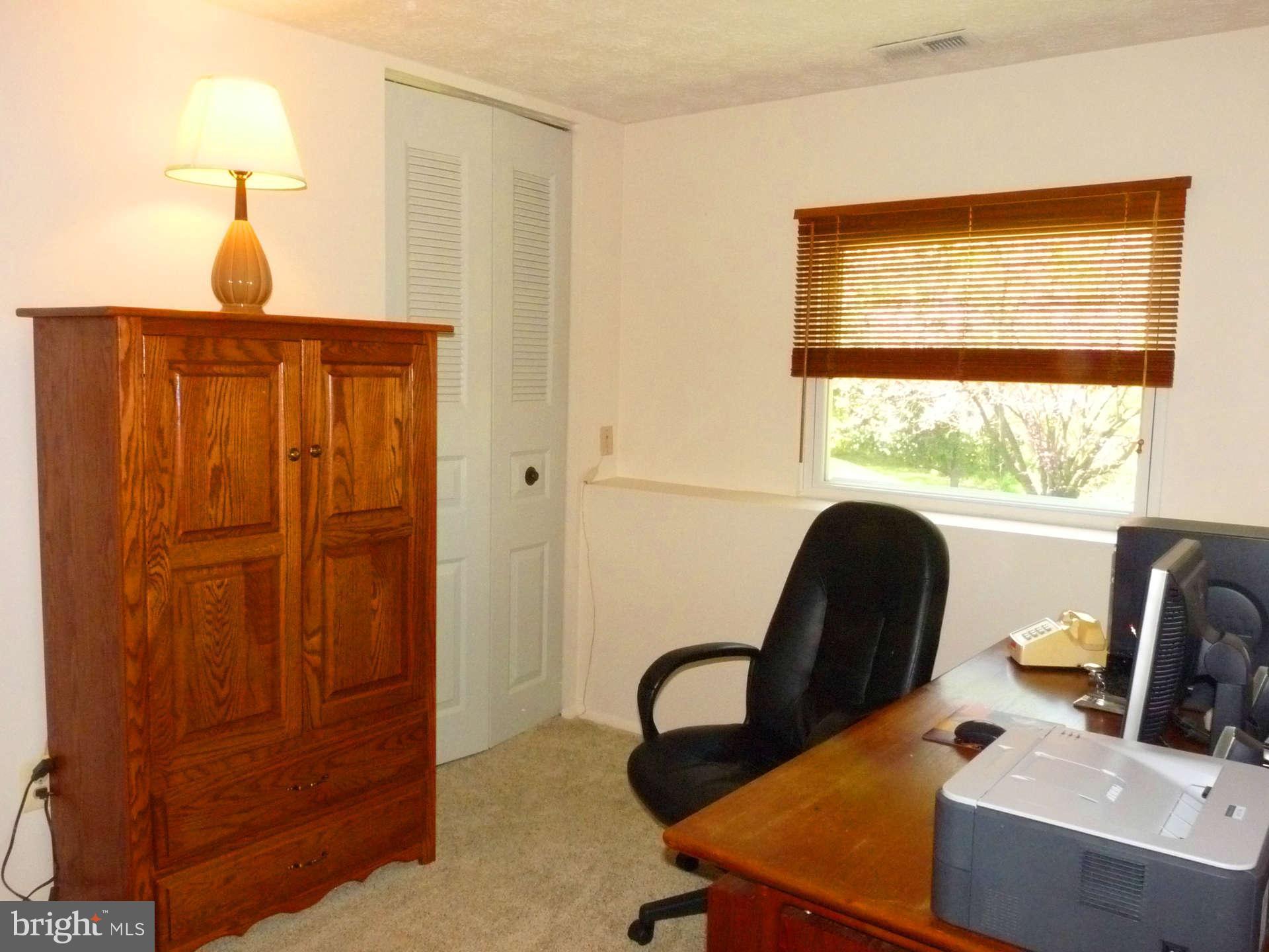 4 Box Baltimore, MD 21221 - Photo 22 of 30 a workspace with furniture and a window