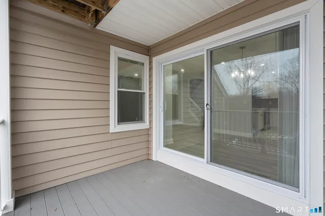 a view of a glass door and window