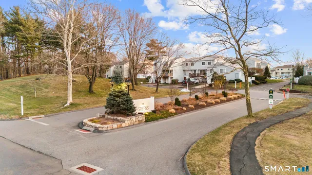 a view of a swimming pool with a yard