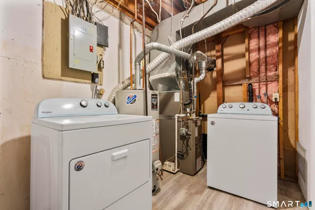 a utility room with dryer and washer