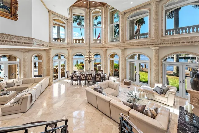 a bath tub sitting in a bathroom next to a window