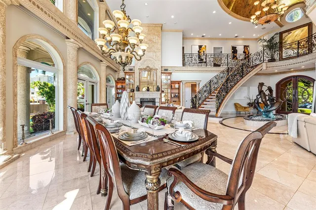 a large kitchen with stainless steel appliances granite countertop a stove and a sink