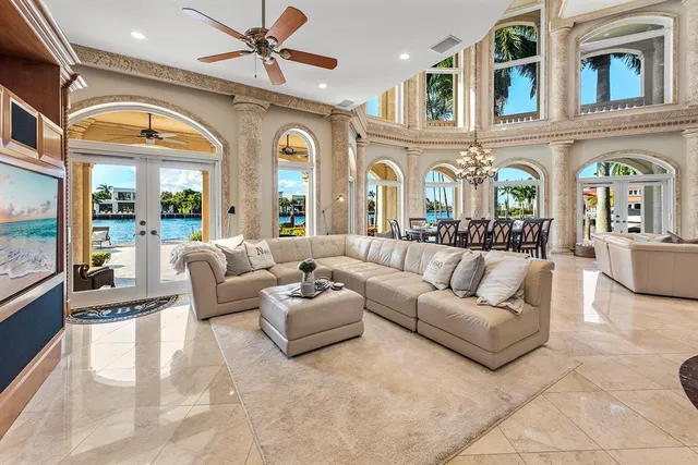 a vase of flowers sitting on a floor