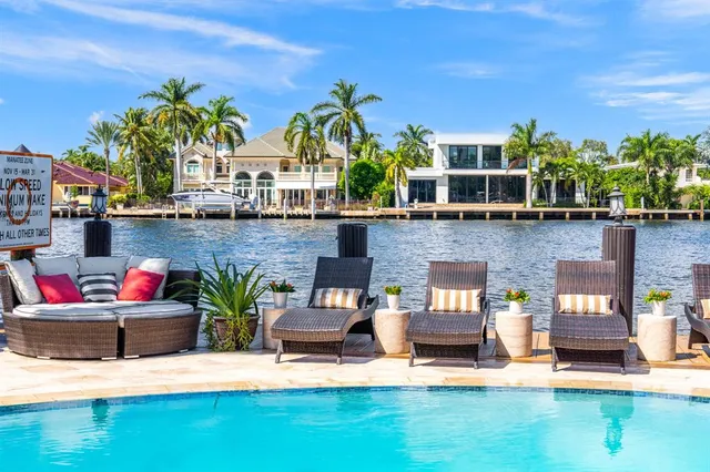 a large kitchen with stainless steel appliances kitchen island granite countertop a large counter top stainless steel appliances and cabinets