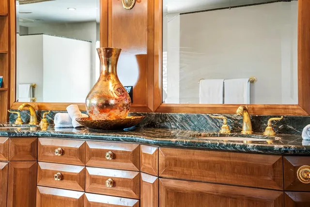 a view of a chairs and table in patio