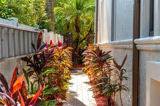 a picture of a bathroom with a sink and mirror