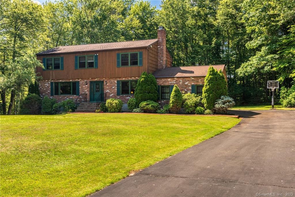 44 Alpine Road. Nestled right in the end of the cul de sac on great level lot.