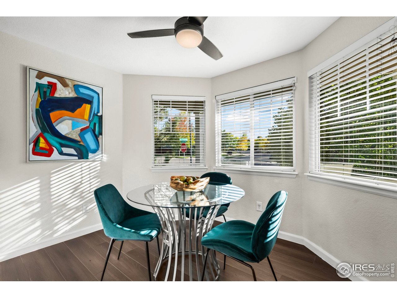 2529 Azalea Way Erie, CO 80516 - Photo 12 of 32 a dining room with furniture and windows