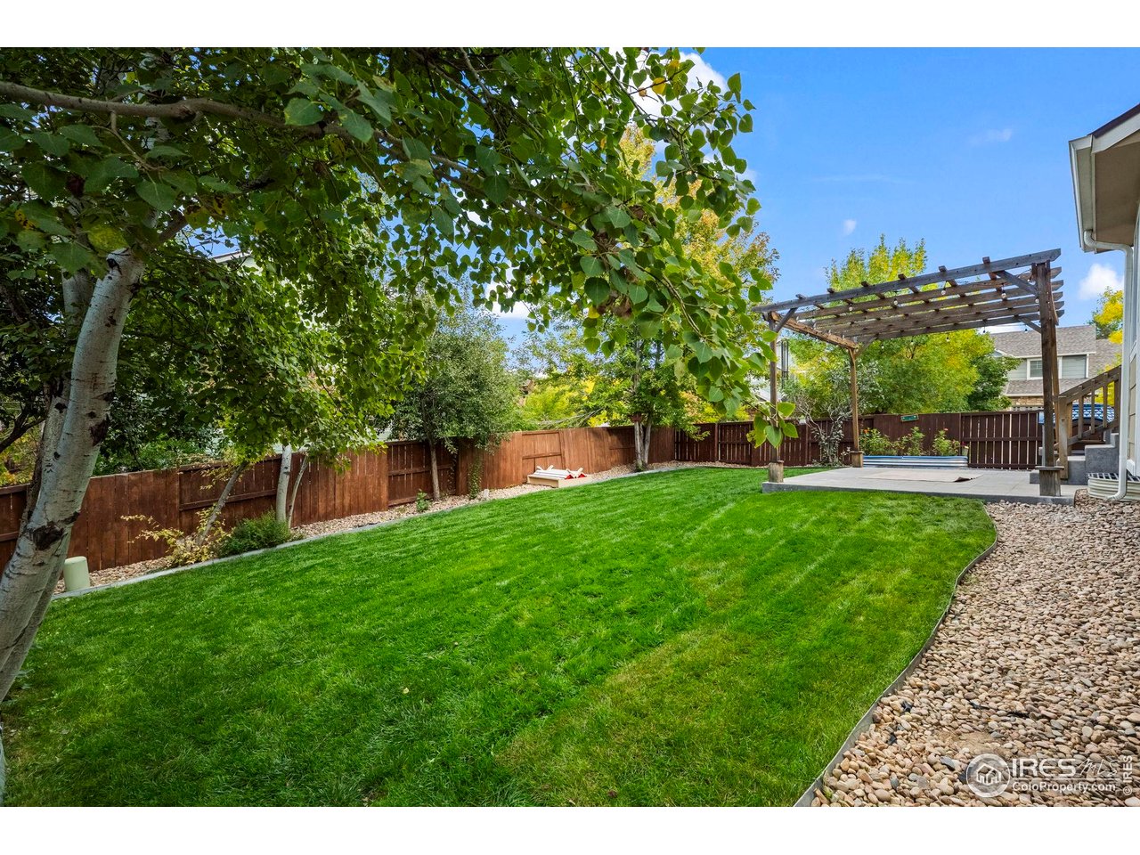 2529 Azalea Way Erie, CO 80516 - Photo 24 of 32 a view of a garden with houses