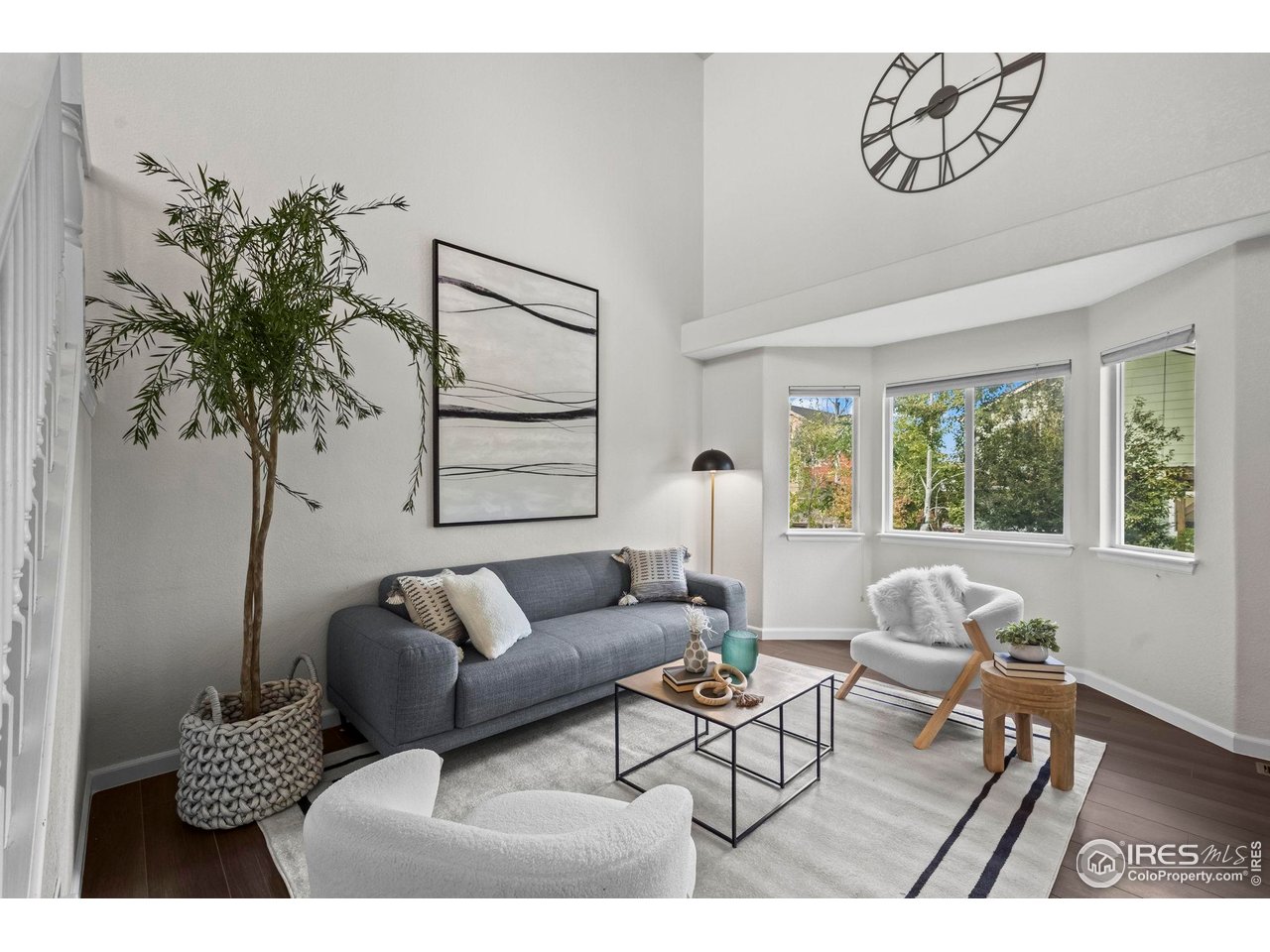 2529 Azalea Way Erie, CO 80516 - Photo 5 of 32 a living room with furniture and a large window