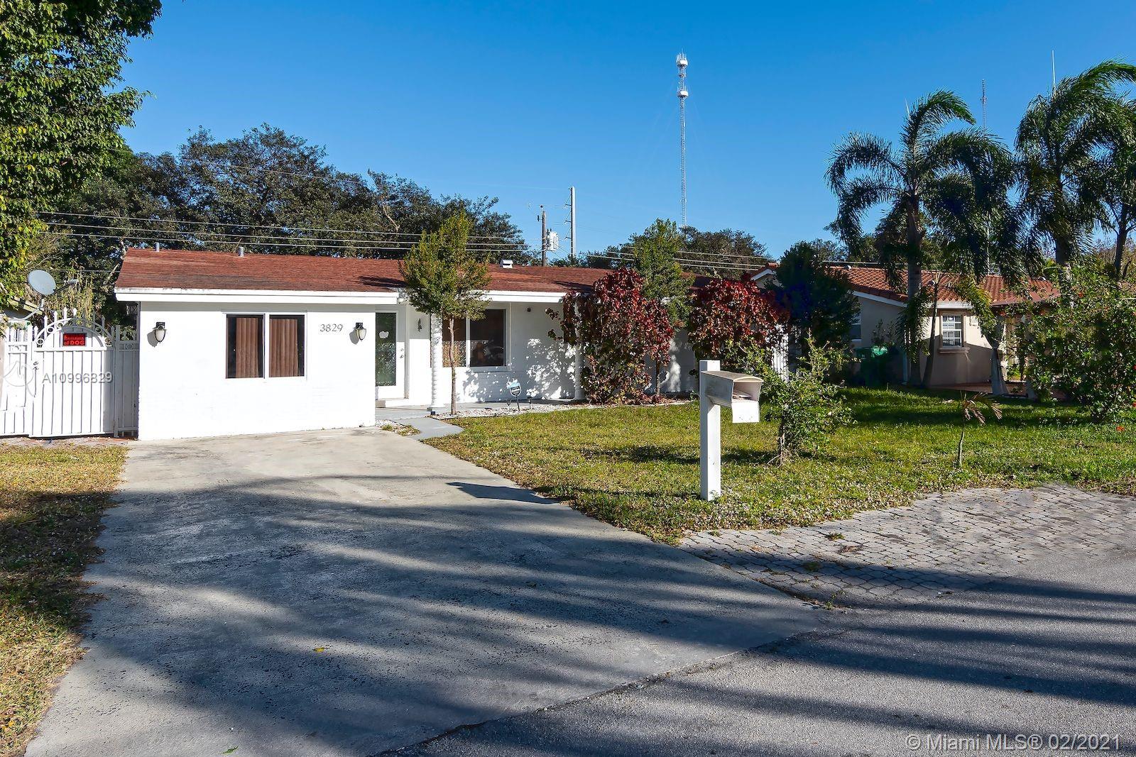 3829 East Shore Road Miramar, FL 33023 - Photo 2 of 14 a house view with garden space