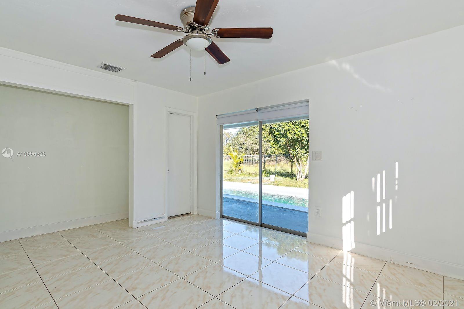 3829 East Shore Road Miramar, FL 33023 - Photo 9 of 14 a view of an empty room and window