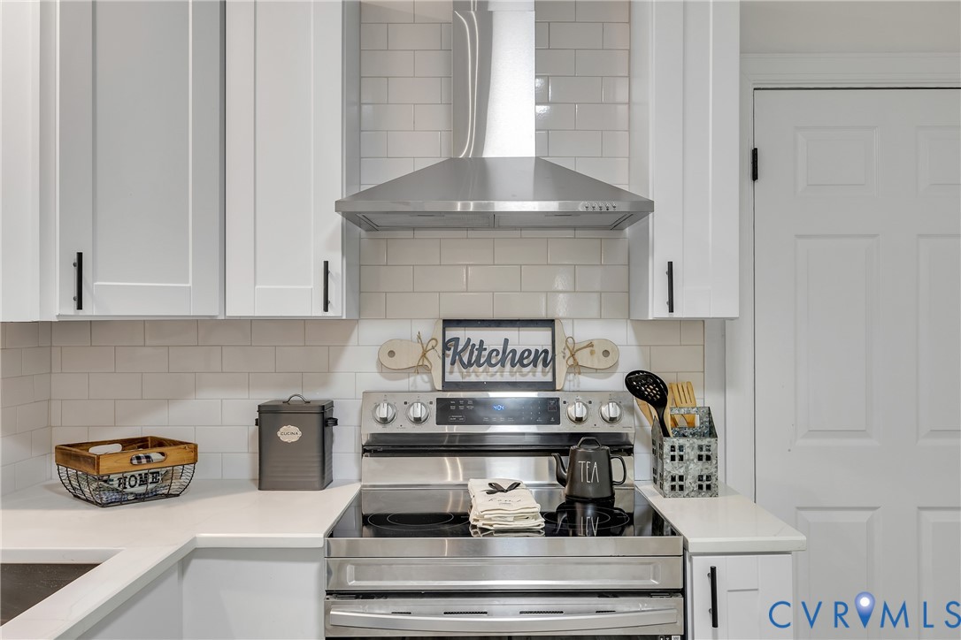 7709 Yolanda Road Henrico, VA 23229 - Photo 14 of 26 Kitchen featuring wall chimney range hood, stainle