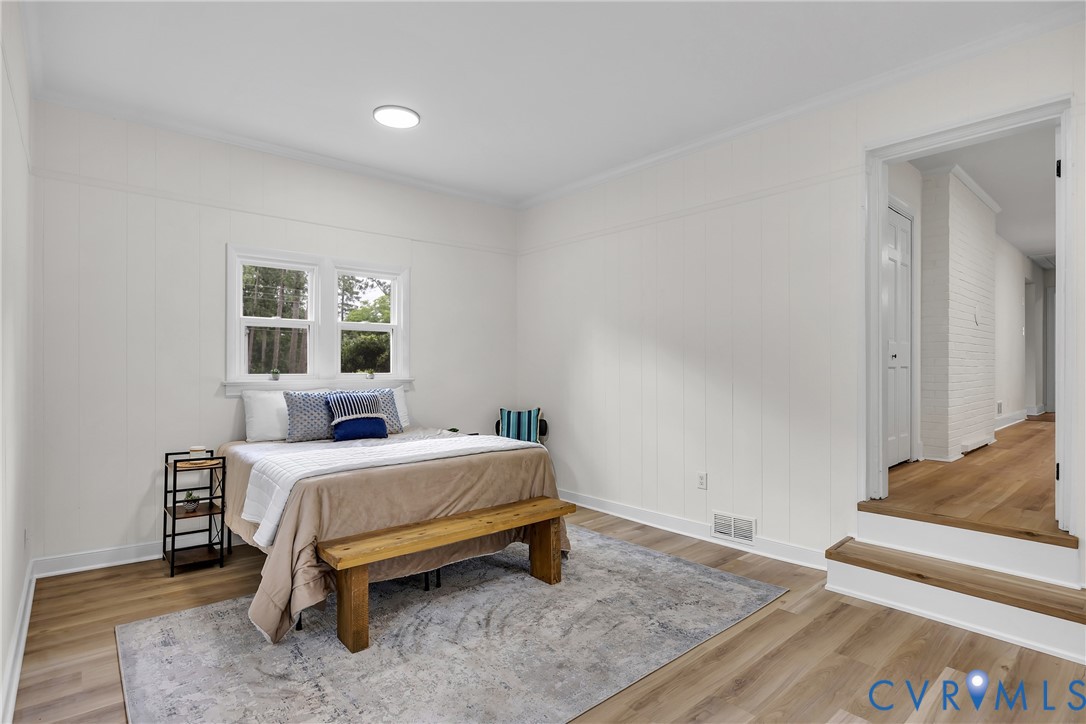 7709 Yolanda Road Henrico, VA 23229 - Photo 17 of 26 Bedroom featuring wood finished floors and ornamen