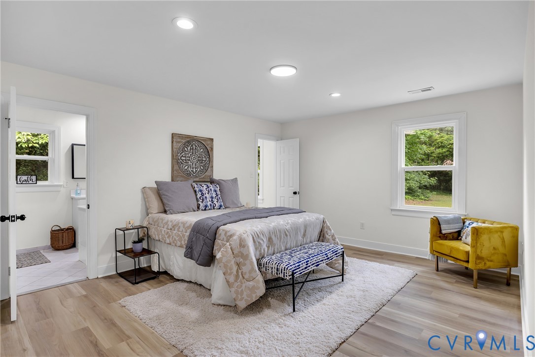 7709 Yolanda Road Henrico, VA 23229 - Photo 20 of 26 Bedroom with light wood-style flooring and recesse