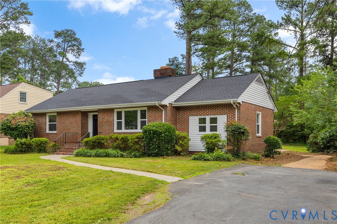 7709 Yolanda Road Henrico, VA 23229 - Photo 2 of 26 Ranch-style home featuring roof with shingles, bri