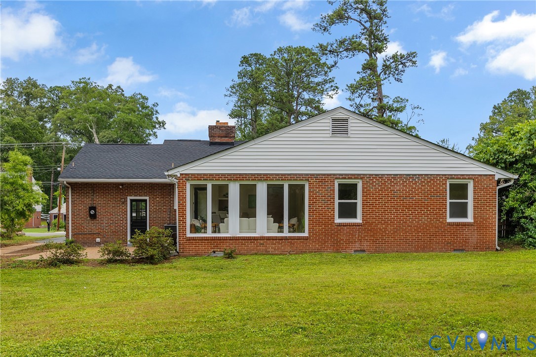 7709 Yolanda Road Henrico, VA 23229 - Photo 26 of 26 Rear view of property with a lawn, brick siding, a