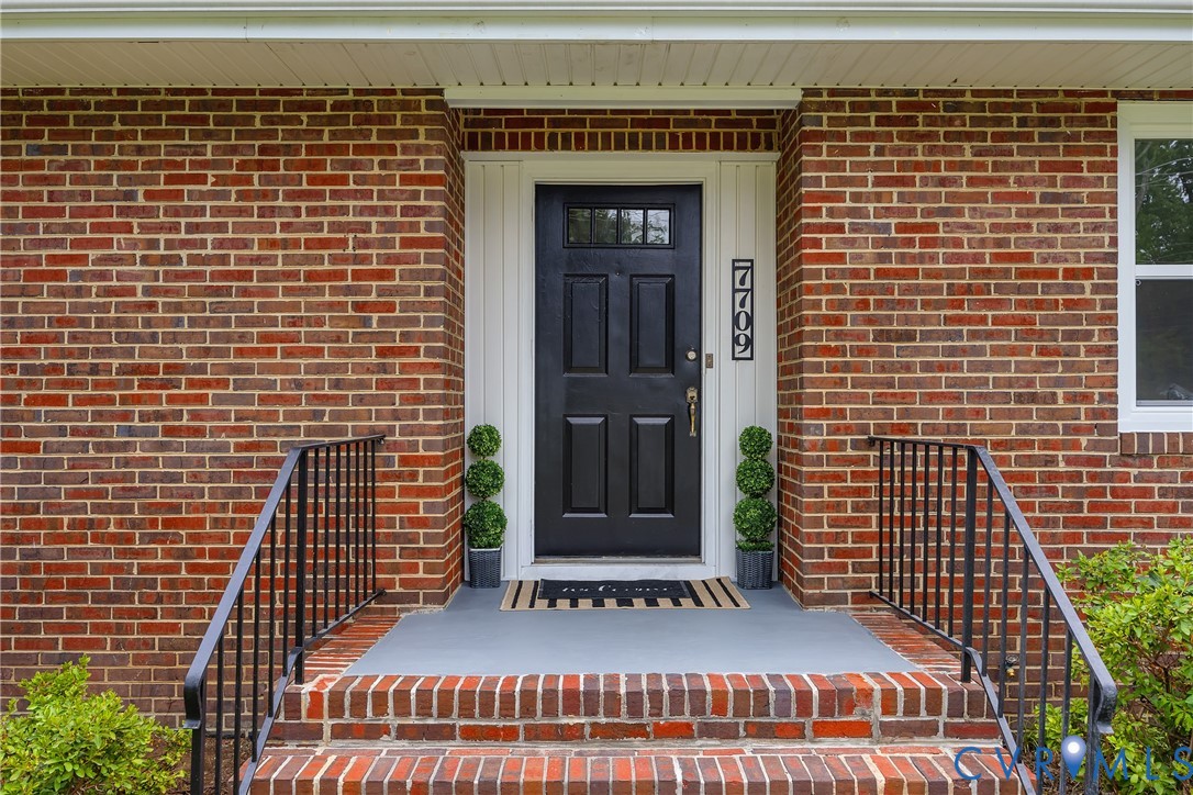 7709 Yolanda Road Henrico, VA 23229 - Photo 3 of 26 Property entrance with brick siding