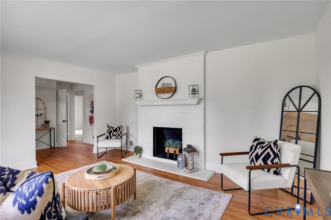 7709 Yolanda Road Henrico, VA 23229 - Photo 7 of 26 Living area featuring wood finished floors and a b