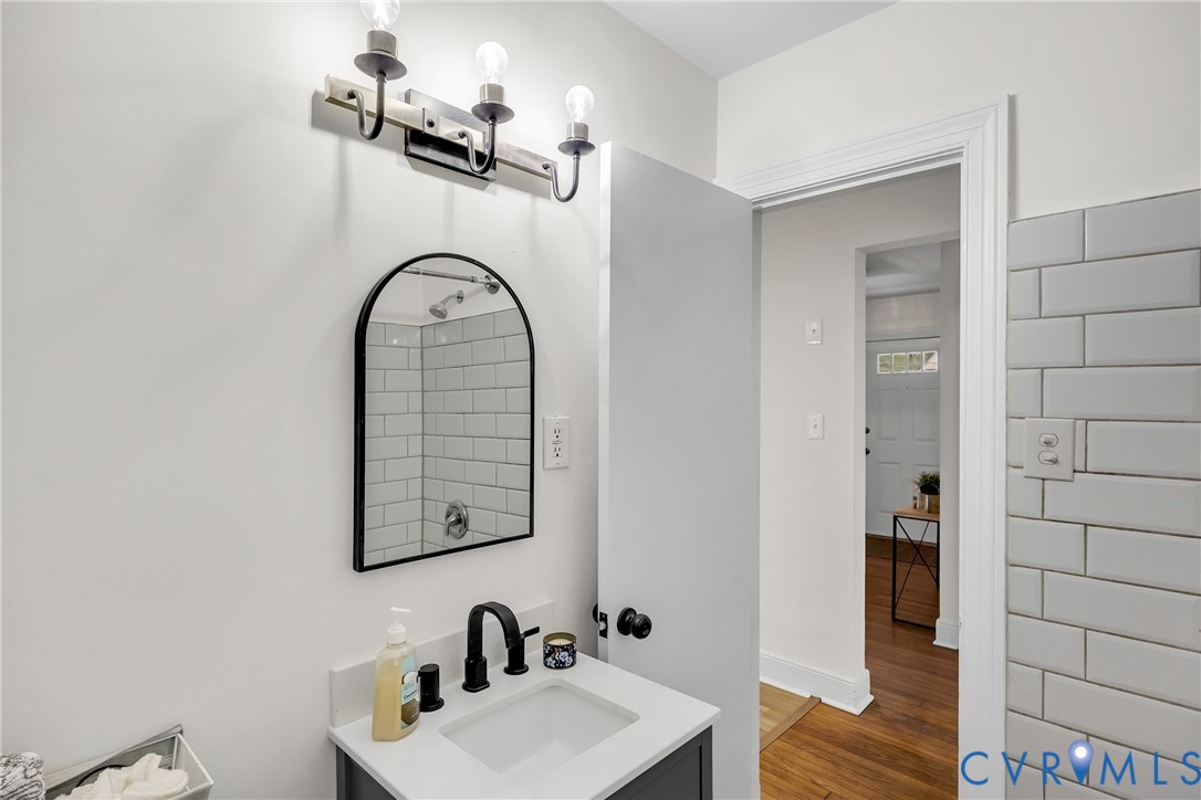 7709 Yolanda Road Henrico, VA 23229 - Photo 10 of 26 Bathroom with wood finished floors and vanity