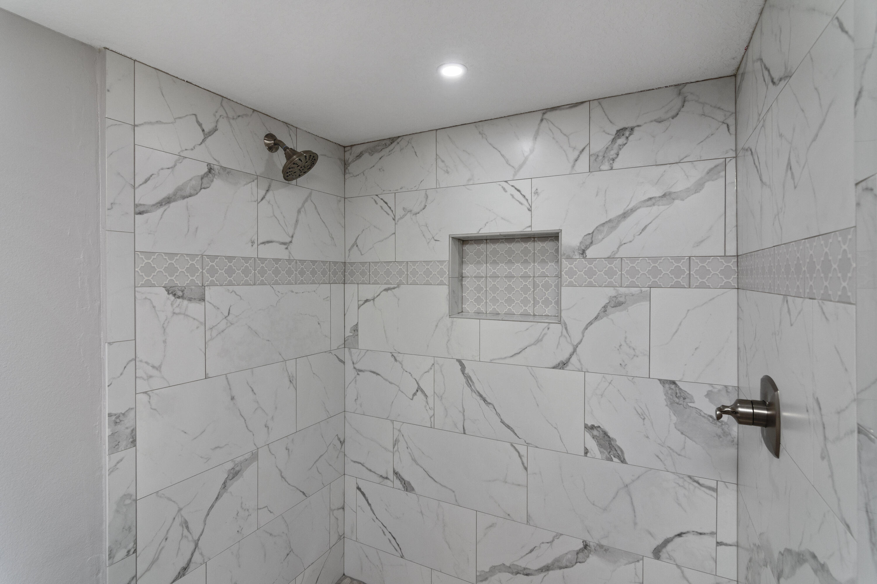 3032 Adams Road Crestview, FL 32536 - Photo 17 of 41 a bathroom with a shower