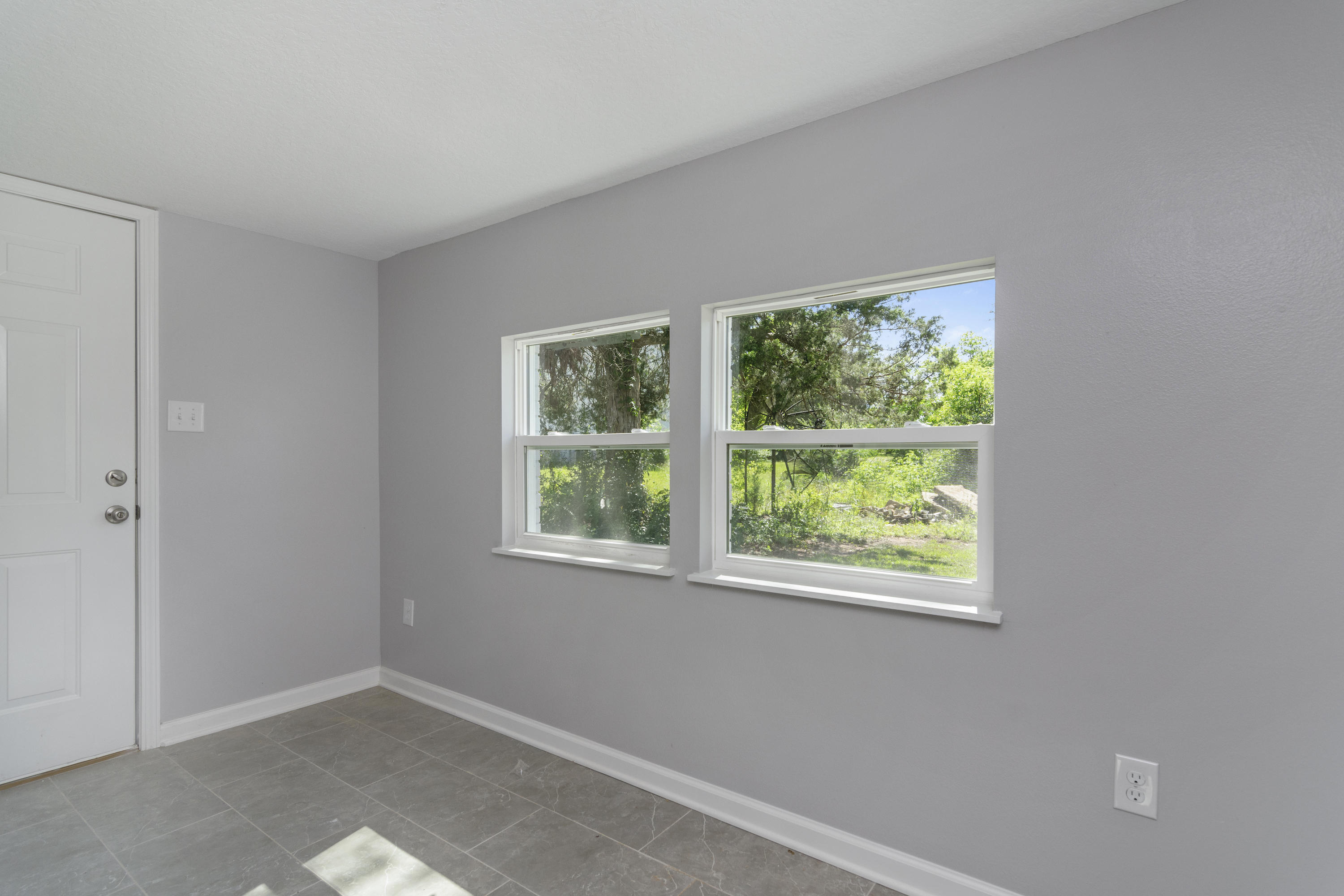3032 Adams Road Crestview, FL 32536 - Photo 28 of 41 an empty room with windows