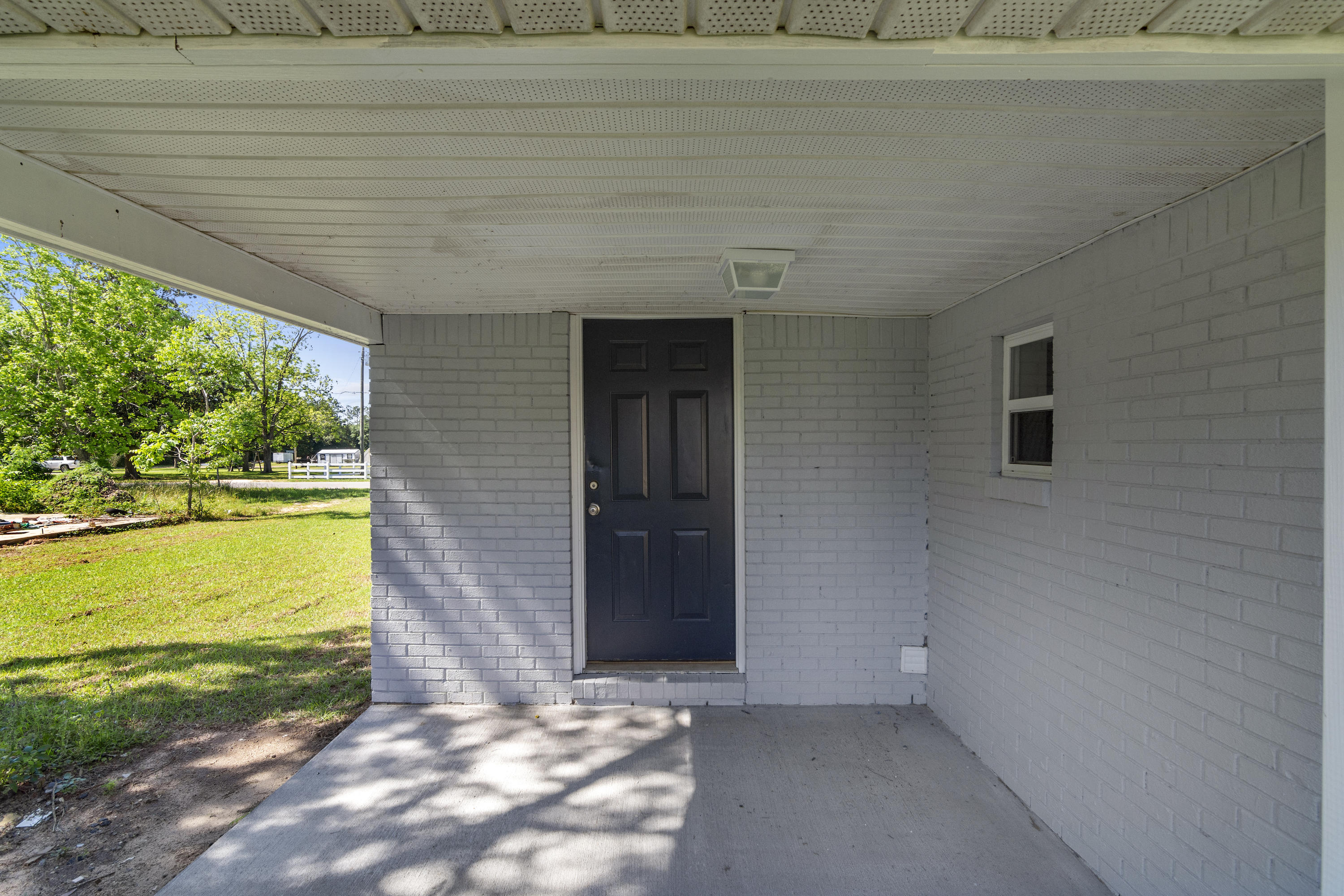 3032 Adams Road Crestview, FL 32536 - Photo 41 of 41 a view of a livingroom with an outdoor space