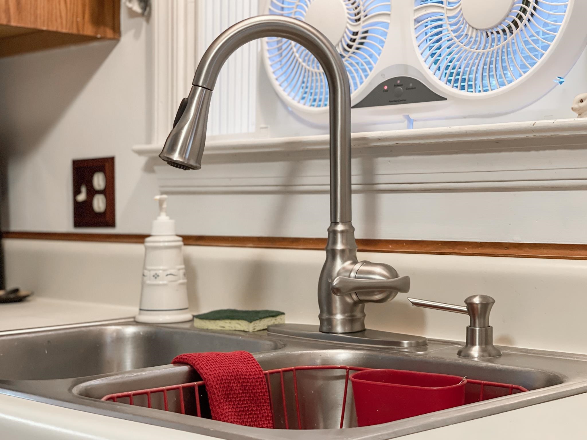 172 Beagle Gap Run Waynesboro, VA 22980 - Photo 17 of 32 a kitchen with a sink and a stove