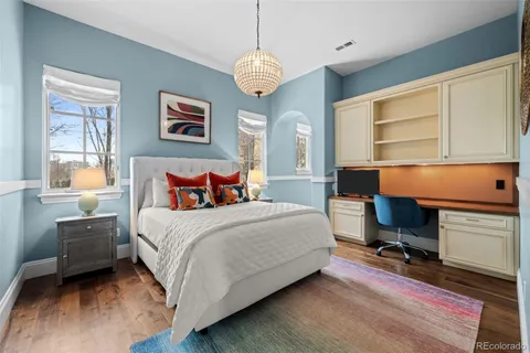 a bedroom with bed and window