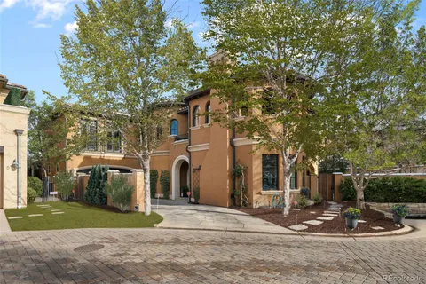 a view of a park that has a tree on the side of it