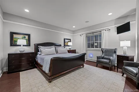 a bedroom with a bed and furniture