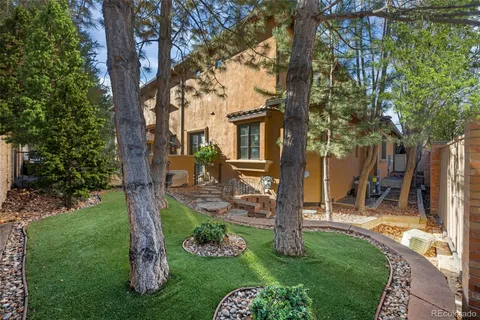 a front view of a house with yard