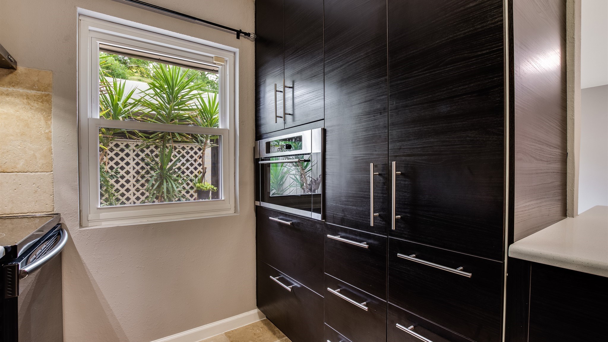 12615 Huntingwick Drive Houston, TX 77024 - Photo 14 of 35 a view of an empty room with a window