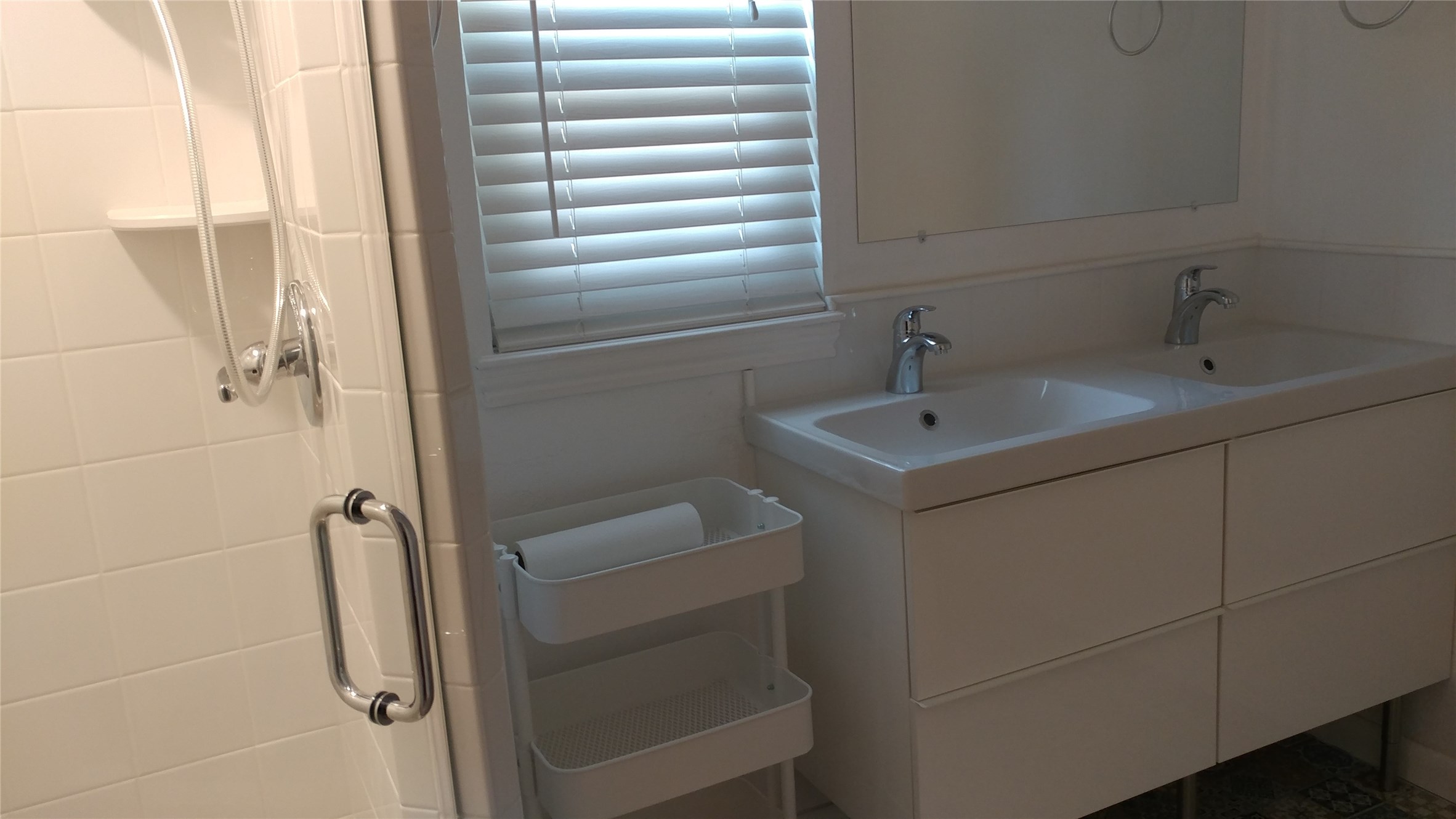 12615 Huntingwick Drive Houston, TX 77024 - Photo 26 of 35 a bathroom with a sink and mirror