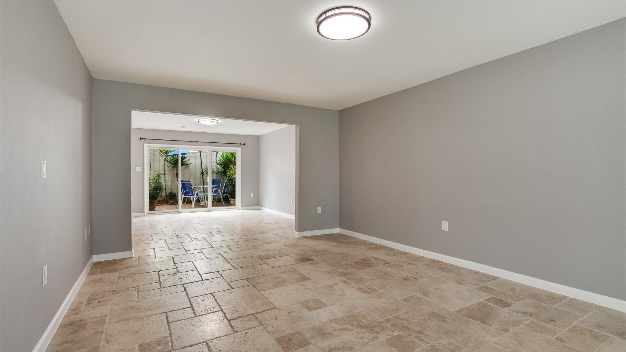 12615 Huntingwick Drive Houston, TX 77024 - Photo 7 of 35 an empty room with windows
