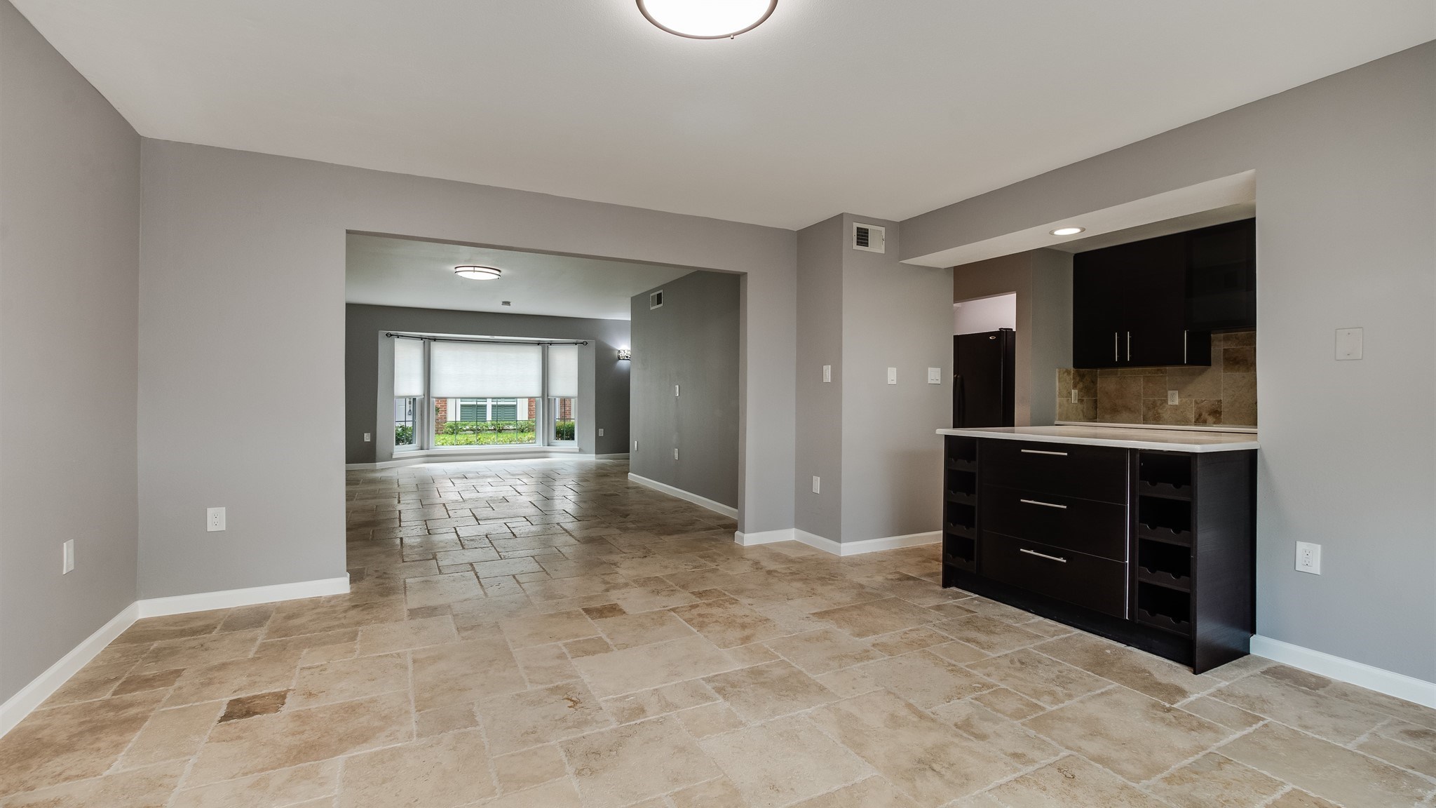 12615 Huntingwick Drive Houston, TX 77024 - Photo 9 of 35 wooden floor and window in a room