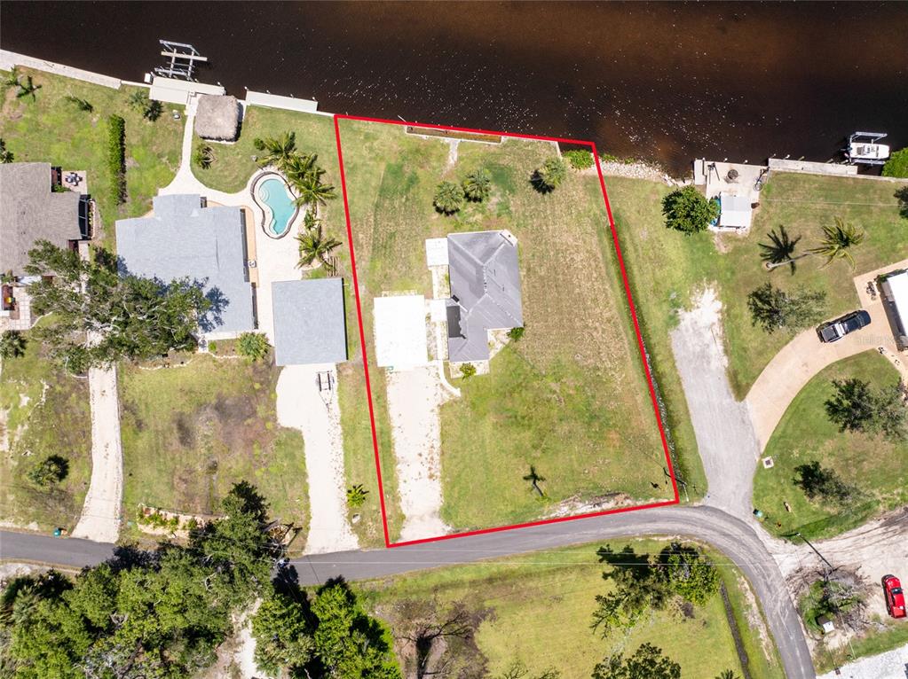 1899 Riverside Drive Englewood, FL 34223 - Photo 19 of 20 an aerial view of a house with a swimming pool
