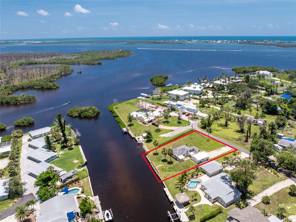 1899 Riverside Drive Englewood, FL 34223 - Photo 6 of 20 an aerial view of a city with ocean view